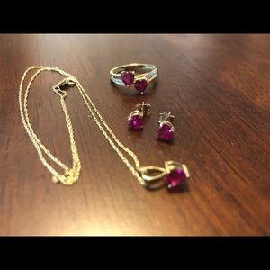 Heart shaped ruby pendant, ring and earrings